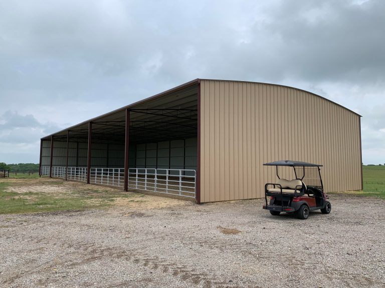 40'x100'x16' Metal Building enclosed on 3 sided on dirt floor.